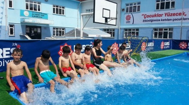 10 bin çocuk okul bahçesinde yüzecek