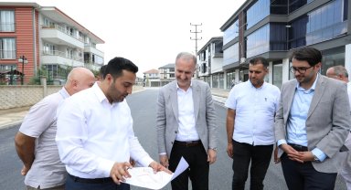 Ertuğrulgazi Mahallesinde tretuvar ve yol kaplama çalışmaları sürüyor