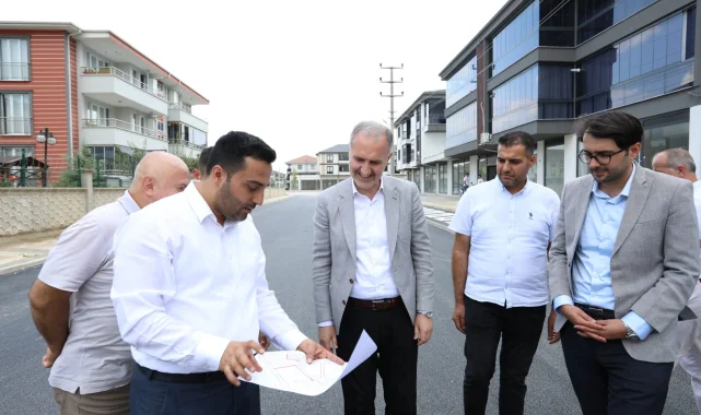 Ertuğrulgazi Mahallesinde tretuvar ve yol kaplama çalışmaları sürüyor
