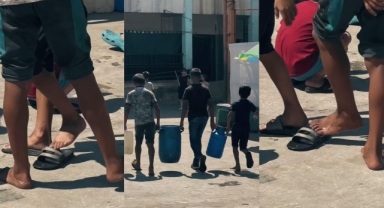 Gazzeli çocuklar, bir çift terliği paylaşarak su taşıdı 