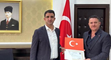 İpsala'dan Keşan'a atanan Müdür Karbuz'a Kaymakam Sevgili'den başarı belgesi