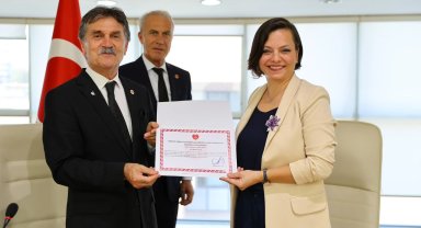 TEMAD'dan Başkan Kınay'a onursal berat