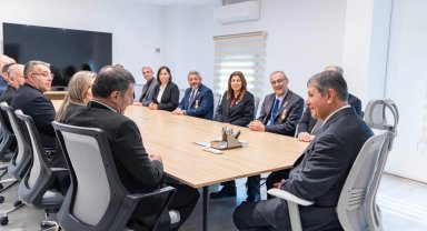 İzmir'de şehit aileleri derneklerinden Başkan Tugay'a ziyaret