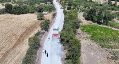 Manisa'da 1999'da açılan yol 27 yıl sonra asfaltla buluştu